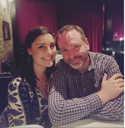 Jennifer Gill with her husband Josh Van Valkenburg ina restaurant